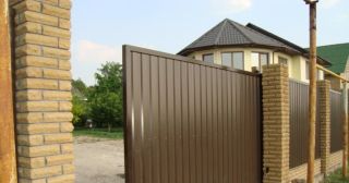 Купить откатные ворота из профнастила Рубцовск, цена от 1770 руб.